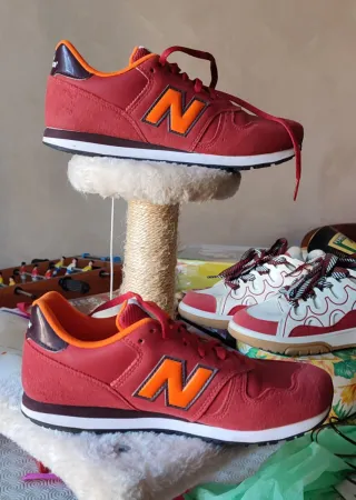 Scarpe New Balance 373 rosse e arancioni