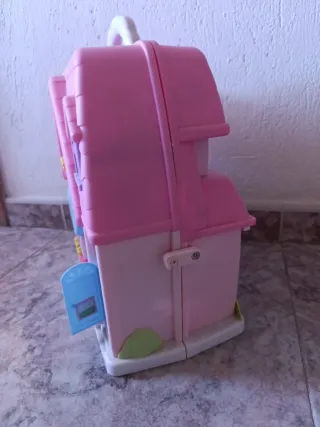 Casa de muñecas rosa