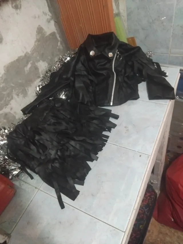 Conjunto niña chaqueta y falda negra