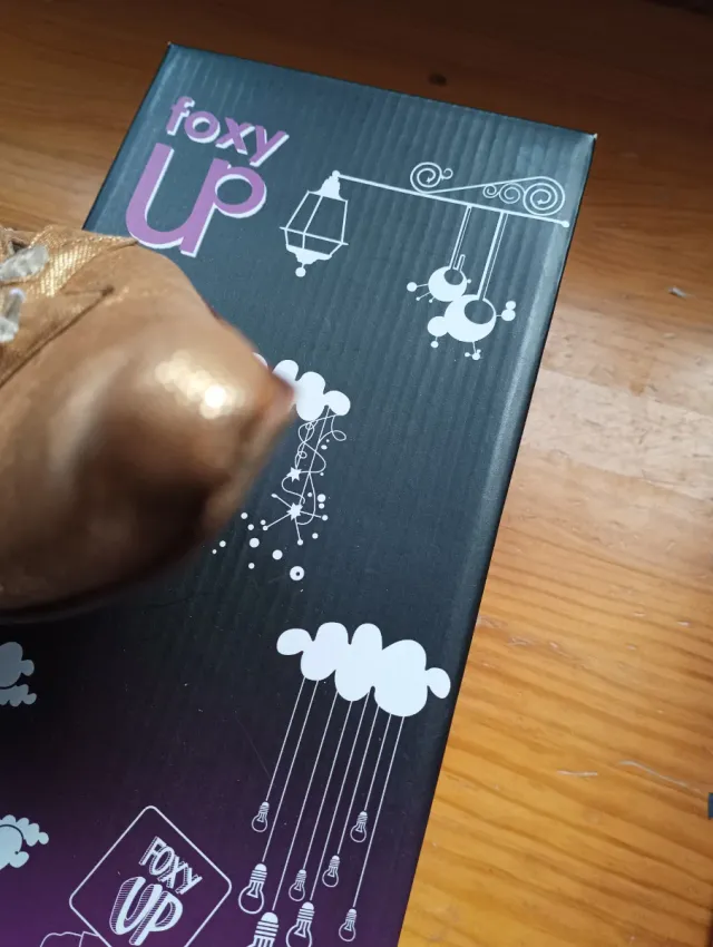 Zapatos de fiesta dorados con estrellas