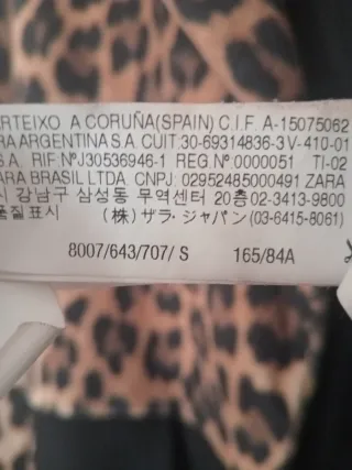 Abrigo estampado leopardo y negro