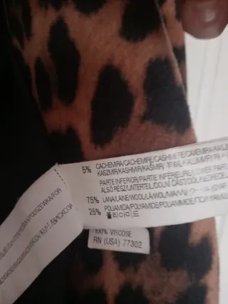 Abrigo estampado leopardo y negro