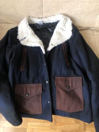 Cazadora de hombre azul y marrón