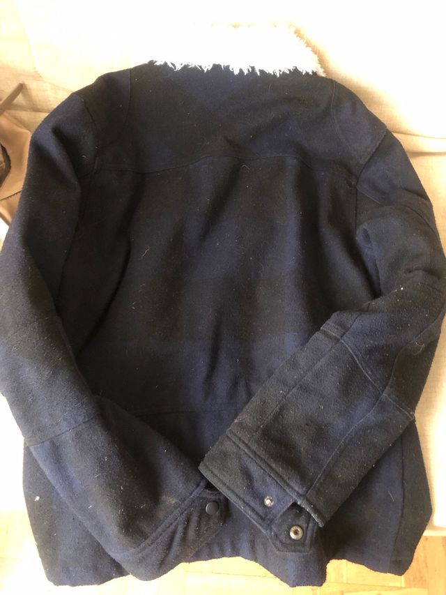 Cazadora de hombre azul y marrón