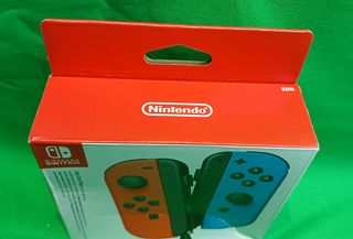 Nintendo Switch Joy-Con Par Rojo/Azul Neón + Funda