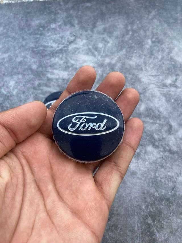 Tapabujes Ford Originales 54mm Azul Marino (4uds)