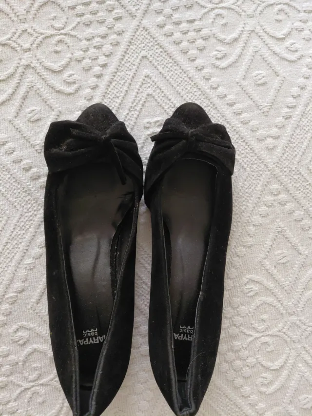 Zapatos planos negros con lazo
