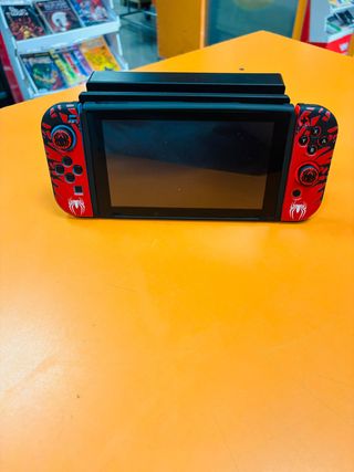 Nintendo Switch con protectores y accesorios