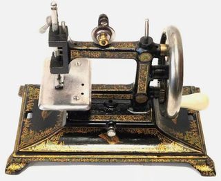 Máquina de coser antigua Colibrí