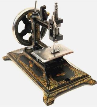 Máquina de coser antigua Colibrí