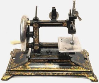 Máquina de coser antigua Colibrí