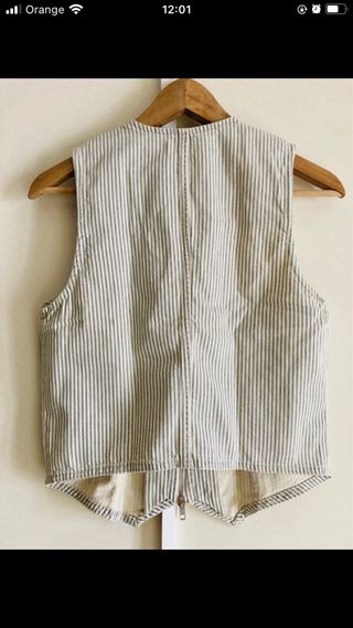 Chaleco con cremallera doble