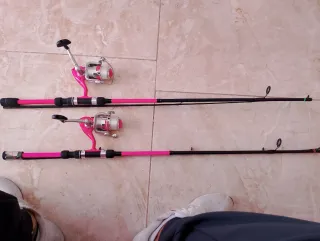 Pareja cañas pesca Dam Vibe rosas