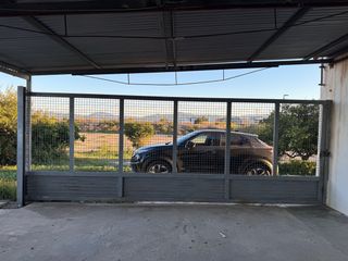 Puerta corredera de hierro