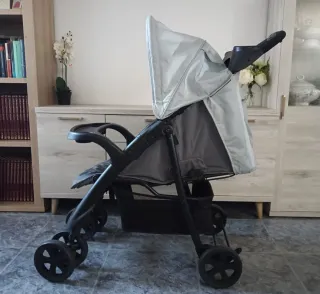 Carrito de bebé + protector de lluvia -leer-