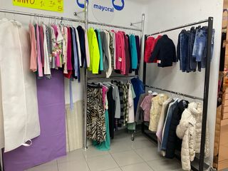 Mobili per negozio di abbigliamento in legno e metallo