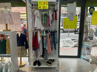 Mobili per negozio di abbigliamento in legno e metallo