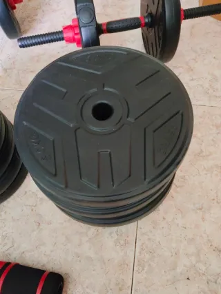 Mancuernas y barra musculación