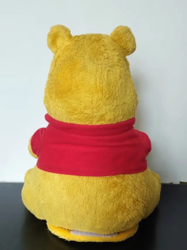 Peluche Winnie the Pooh con tarro miel