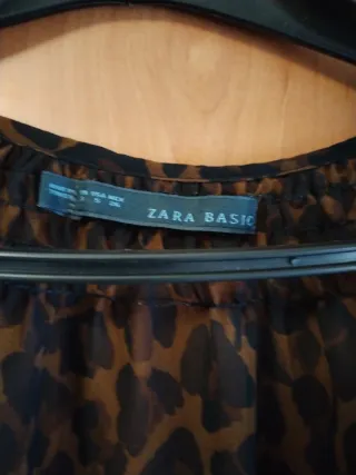 Blusa animal print manga larga