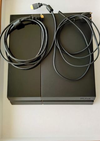 PS4 Slim + mando original – Semi nueva, impecable