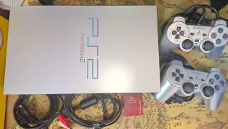 PlayStation 2 Plateada en caja
