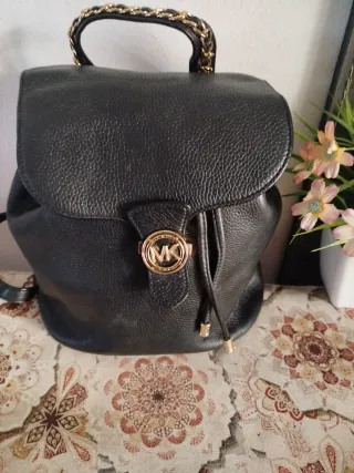 Mochila Michael Kors Negra y Dorada