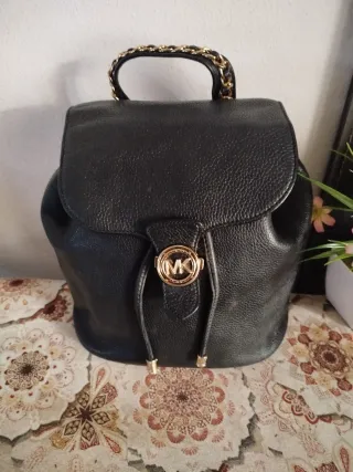 Mochila Michael Kors Negra y Dorada