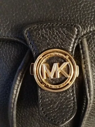 Mochila Michael Kors Negra y Dorada
