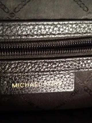 Mochila Michael Kors Negra y Dorada