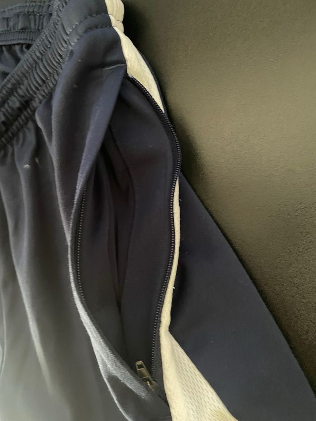 Pantalón deportivo Nike azul marino y blanco