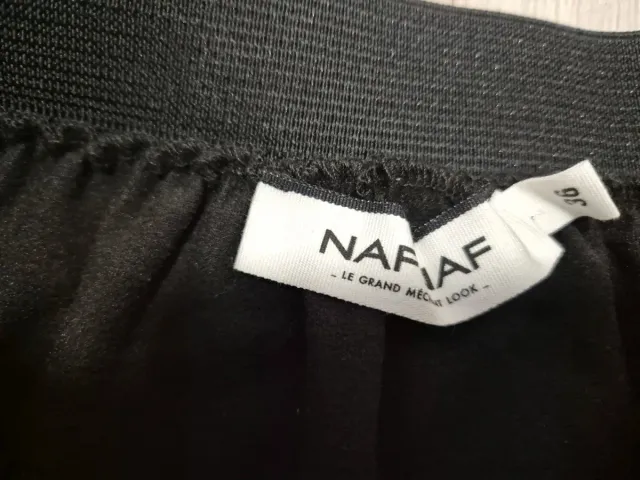 Falda mini efecto piel negra