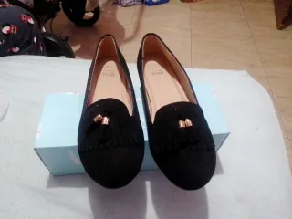 Manoletinas negras con detalle de flecos