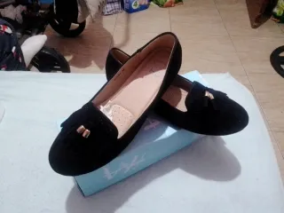 Manoletinas negras con detalle de flecos