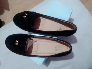 Manoletinas negras con detalle de flecos