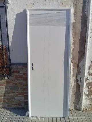 Puerta trastero reversible blanca galvanizada