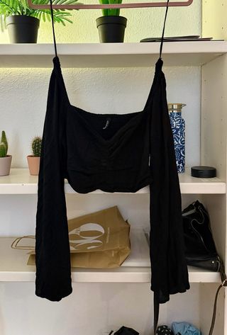 Blusa negra manga larga