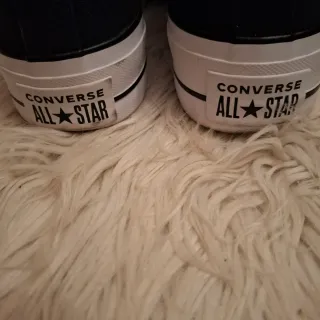 Converse All Star negras plataforma