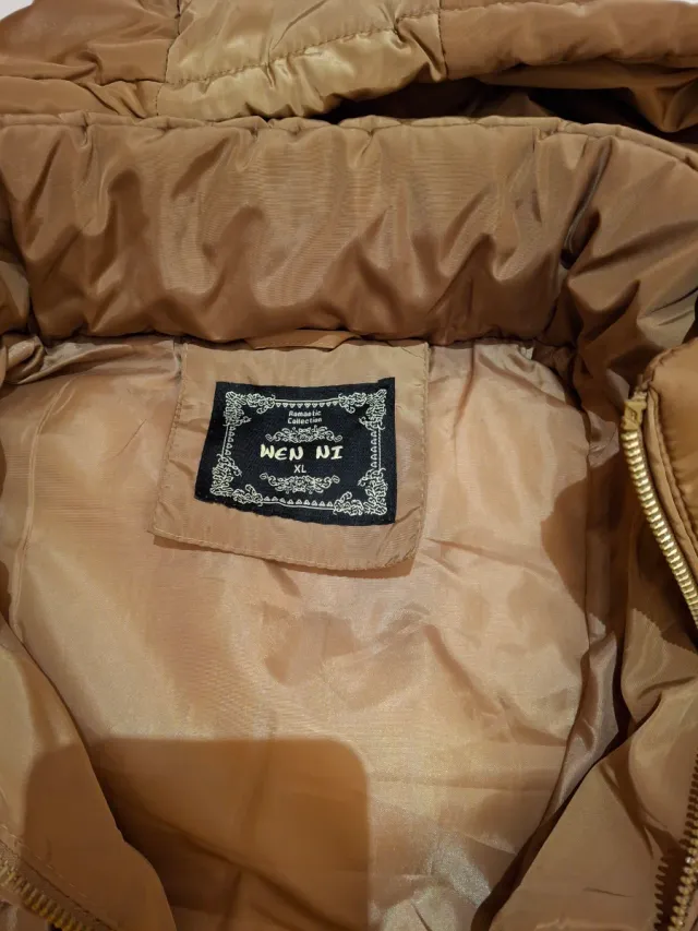 Chaleco largo acolchado con capucha