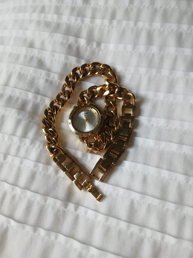 Reloj dorado doble cadena