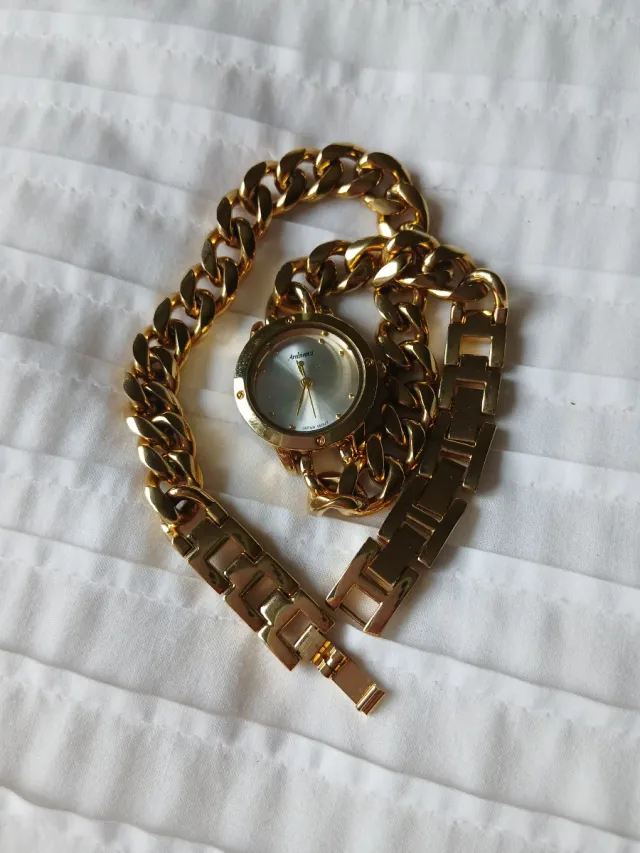 Reloj dorado doble cadena