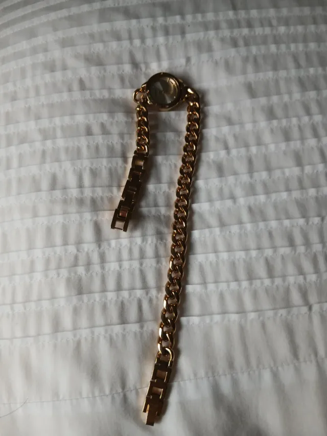 Reloj dorado doble cadena