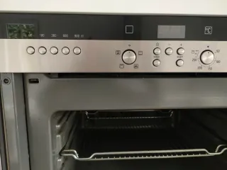 Horno compacto Siemens con microondas.