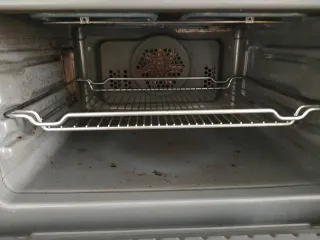 Horno compacto Siemens con microondas.