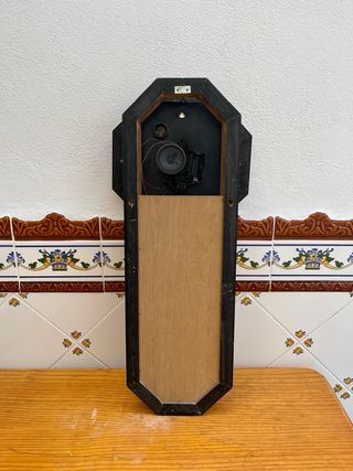 Reloj de pared octogonal con péndulo