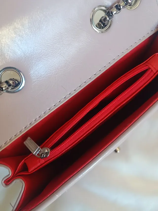 Bolso acolchado rosa/lila con cadena