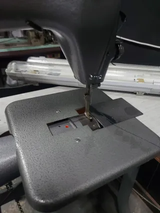 Máquina de coser Singer de brazo