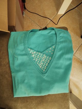 T-shirt turchese in cotone con scollo a V