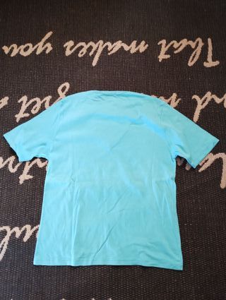 T-shirt turchese in cotone con scollo a V