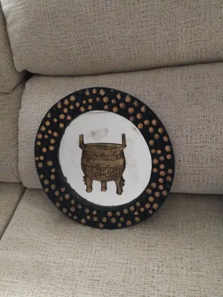 Espejo decorativo con diseño de vasija